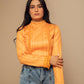 Top orange avec col roulé
