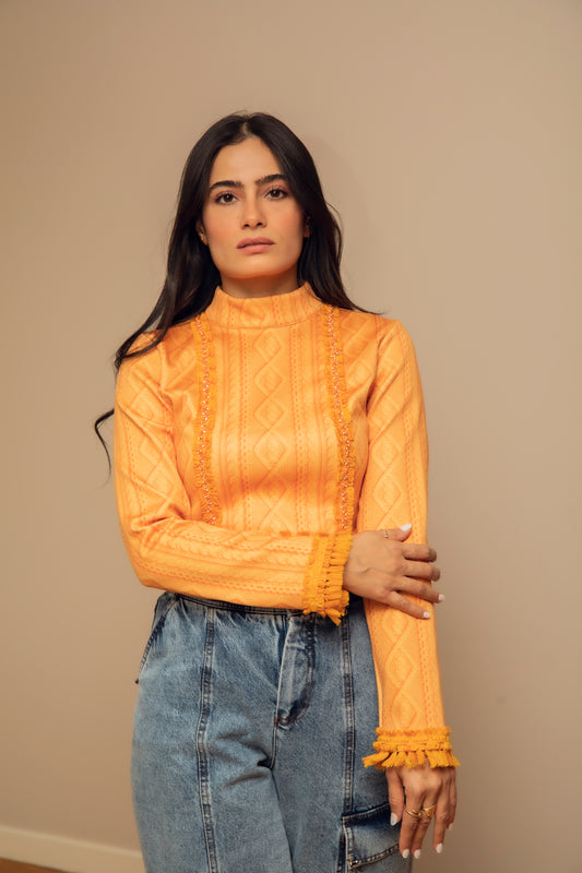 Top orange avec col roulé