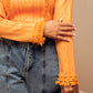 Top orange avec col roulé