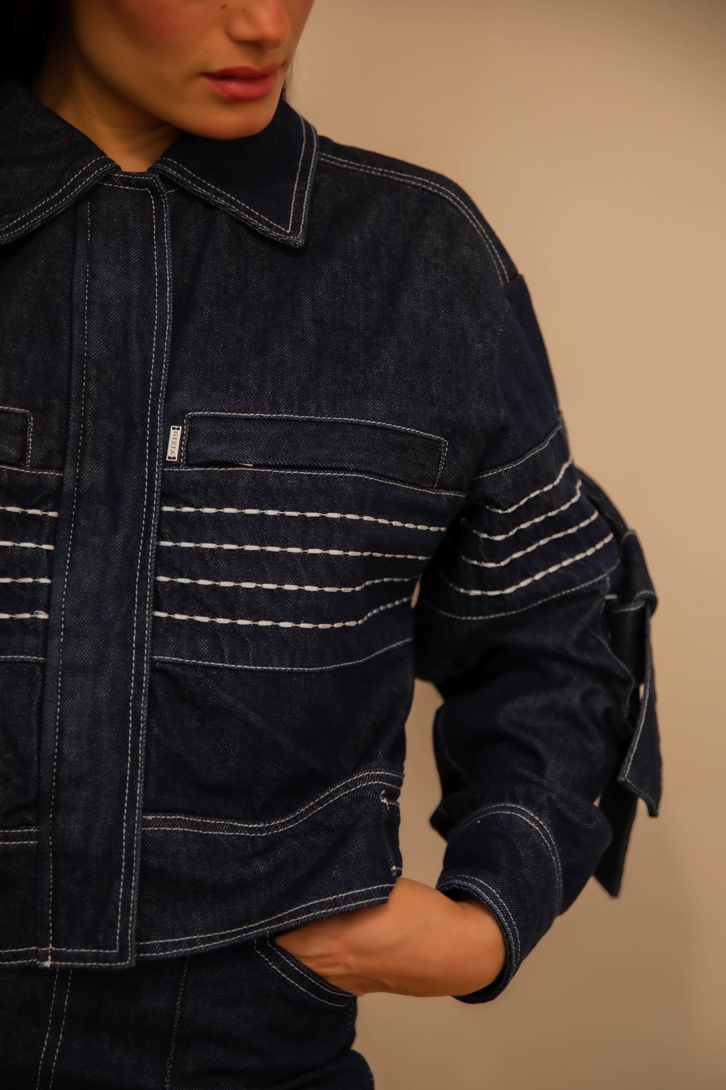 Denim jacket with embroidered sleeve trim details