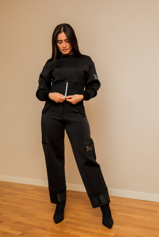 Pull noir avec détail d'étiquette